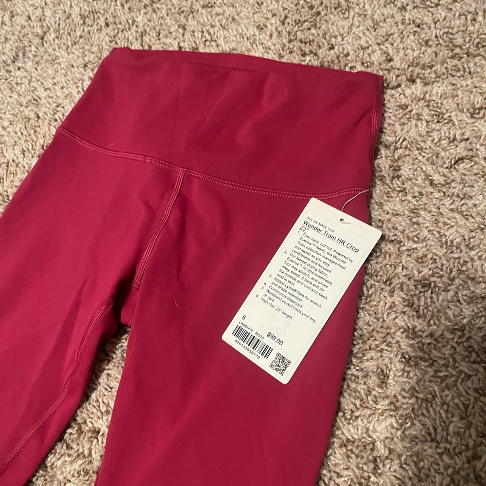Lululemon Wunder Train 23” NWT Women’s size 6 Pink Berry High Rise Leggings